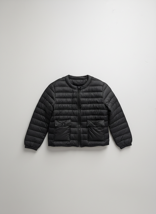Black puffer jacket on a light gray background