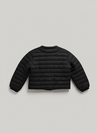Black puffer jacket on a light gray background